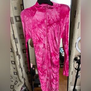 Pink zip down romper in good condition